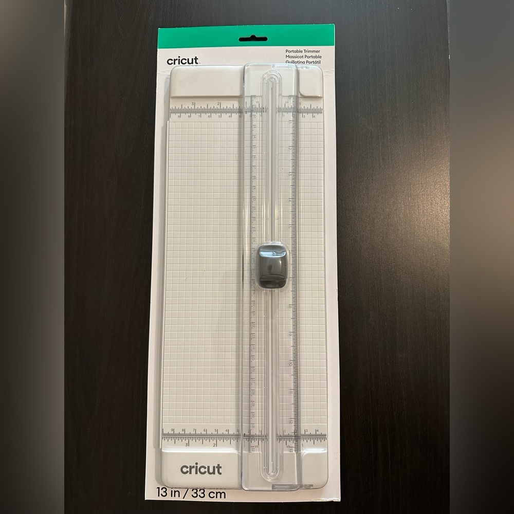 Cricut 13” portable trimmer. New in packaging